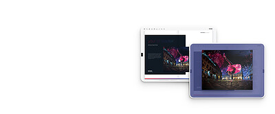Deux tablettes : une page de Fluidbook et la même photo agrandie par une zone de zoom